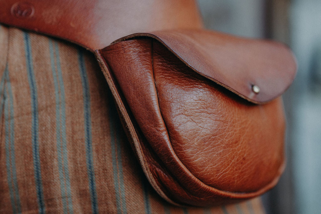 Gürteltasche Cognac mit Patina ein Jahr alt.